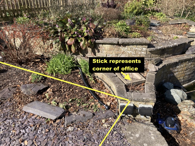 NE corner, showing the wall and electics that may need moving.